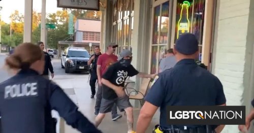 Police stood around as Proud Boys tried to smash their way into a bar’s drag show