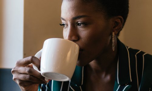 Does Putting This In Your Coffee Lead To More Youthful Skin? Here's What To Know