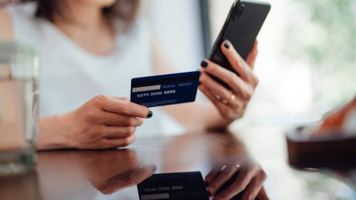 Credit card users paid nearly $164 billion in fees, interest in 2022. It may 'get a little worse,' analyst warns