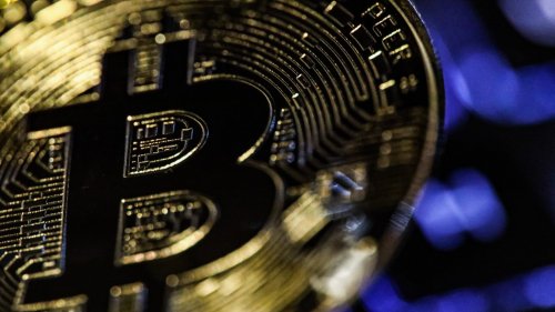 Bitcoin briefly tops $28,000 for the first time in 9 months after bank crisis sparks weekend rally