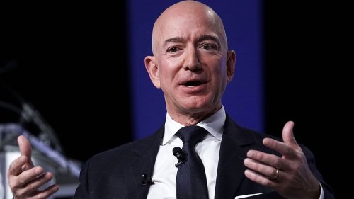 Jeff Bezos keeps a 16-year-old framed magazine as a 'reminder' that Amazon's most profitable service was once just a 'risky bet'