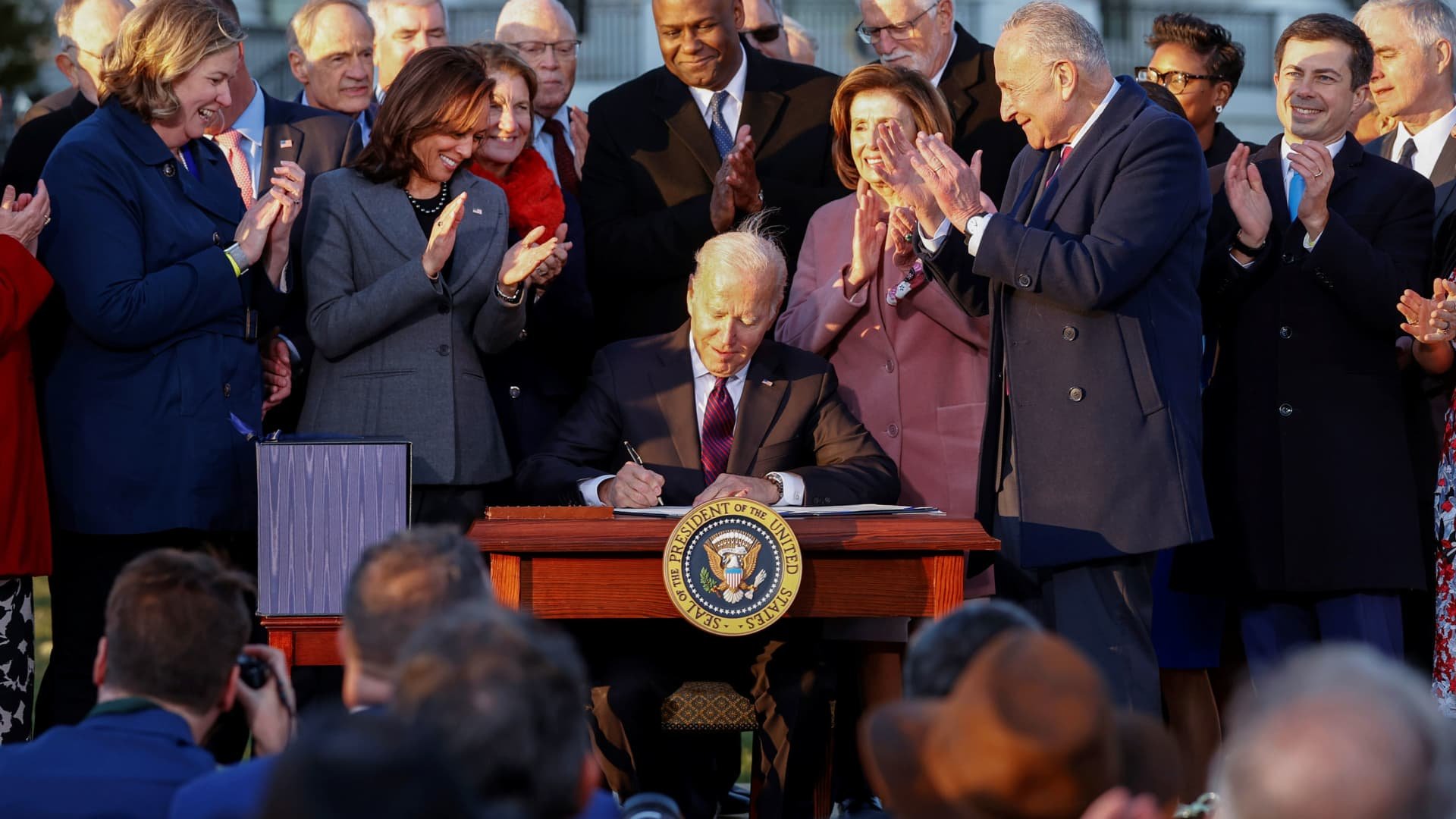 Biden signs $1 trillion bipartisan infrastructure bill into law, unlocking funds for transportation, broadband, utilities