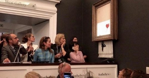 See Banksy painting self-destruct after going for $1.4 million at auction