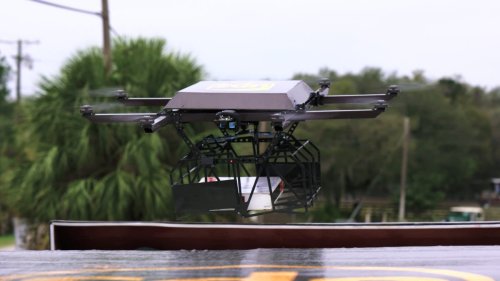 UPS tucks delivery drone into delivery truck to make a delivery