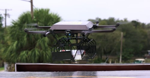 UPS tucks delivery drone into delivery truck to make a delivery