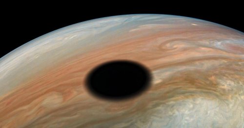 Jupiter gets a great black spot in NASA Juno view of Io's inky shadow