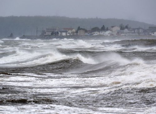 Fiona slams Canada’s Atlantic coast, knocking out power for thousands and damaging homes