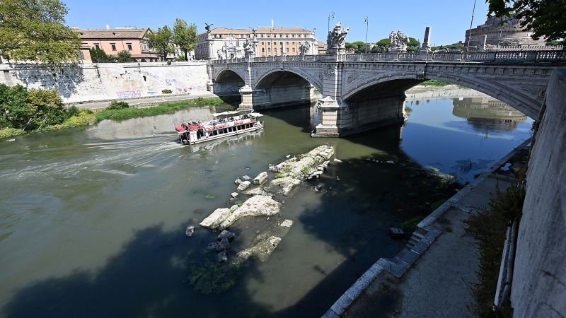 Low water in Rome’s drought-hit Tiber river exposes ancient ruins of Nero’s Bridge