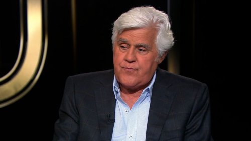 Jay Leno shows his new ear after accident