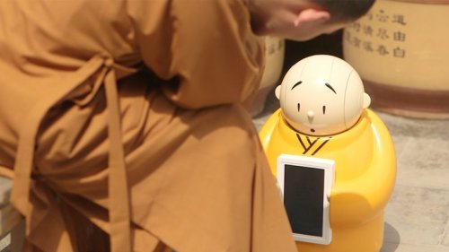 Robot monk dispenses Buddhist wisdom at Beijing temple