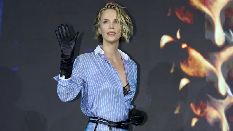 Look of the Week: Charlize Theron’s provocative rain-slicker ‘Odyssey’ tour outfit explained