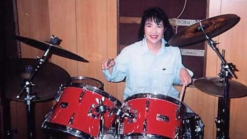 Japan’s aspiring leader drums to relieve stress. She has many reasons to reach for her sticks