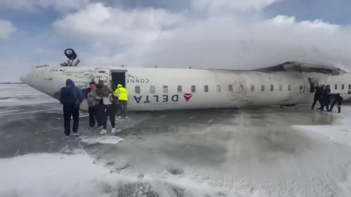 Emergency teams respond to overturned plane in Toronto