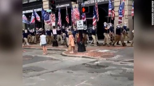 Group wielding White nationalist flags march along Boston's Freedom Trail on July 4 weekend