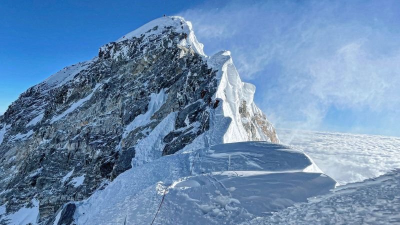 Why do people want to climb Mount Everest?