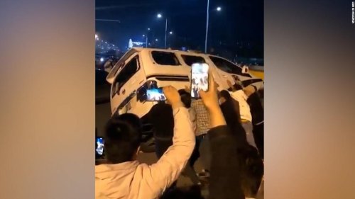 Protesters Overturn Car Amid Violent Clashes At World's Largest IPhone ...