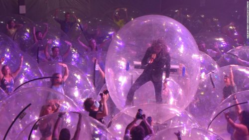 The Flaming Lips performed a concert with the band and fans encased in plastic bubbles