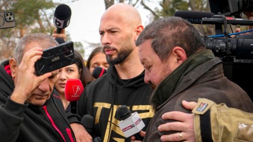Self-proclaimed misogynist Andrew Tate and his brother appear at police station in Romania