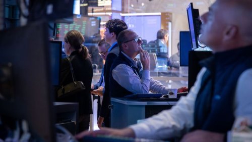 Stocks tumble and dollar hits three-year low as Trump bashes Powell again
