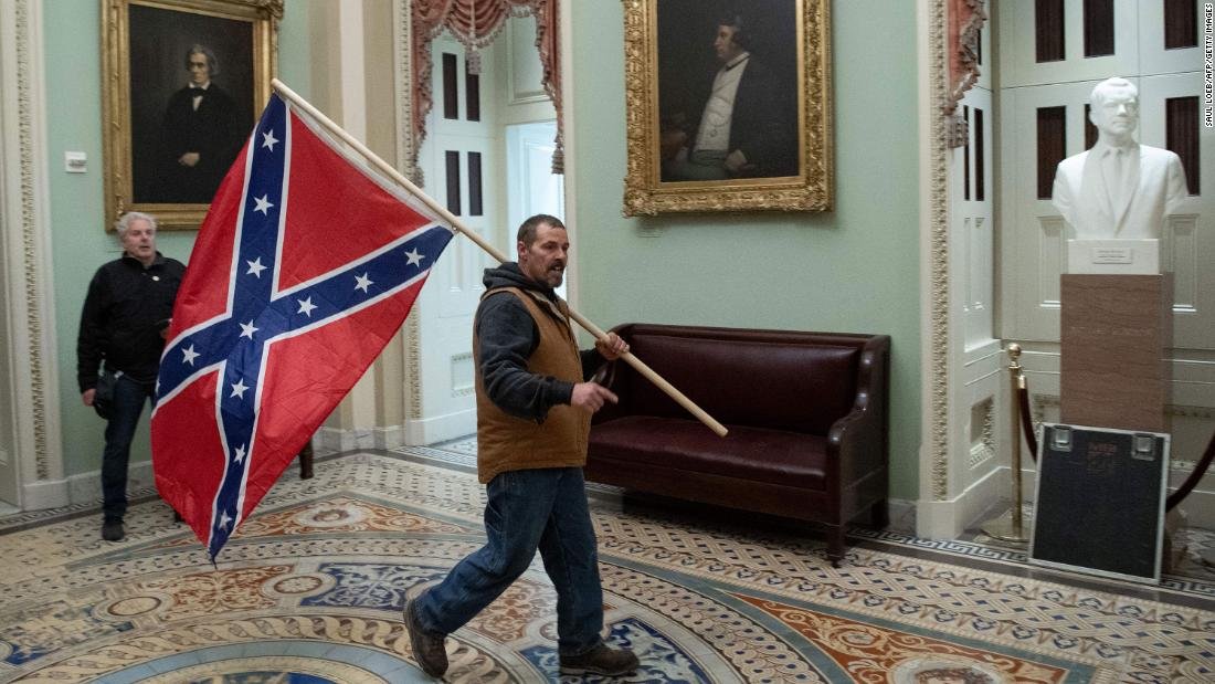 A Confederate flag at the Capitol summons America's demons