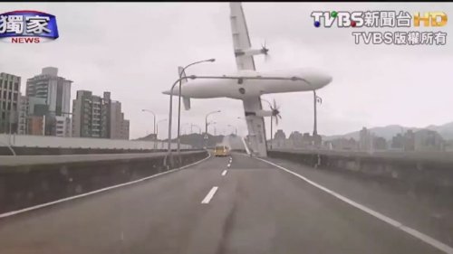 Plane hits bridge, crashes into river