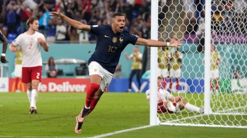 Kylian Mbappé goals ensure defending champion France is first side to seal spot in World Cup knockout stages