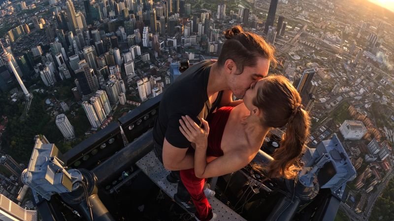 This couple's hobby? Illegally scaling the world's tallest buildings together