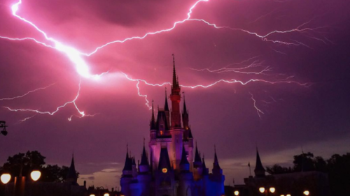 Storm lights up Disney World’s Magic Kingdom castle with lightning strikes