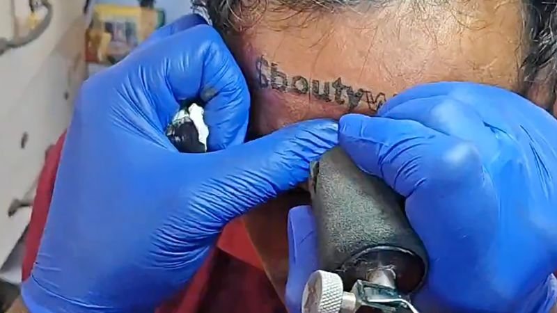 The website where crypto promoters pay people to tattoo ads on themselves