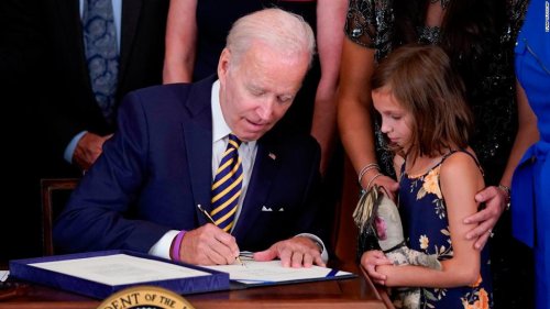 Biden signs bill expanding health care benefits for veterans exposed to toxic burn pits