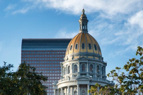 Colorado trooper who guards Capitol and governor charged with felony menacing after pointing gun at driver