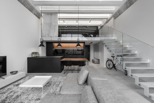 A Lithuanian Loft Interior With A Monochrome And Wood Material Palette