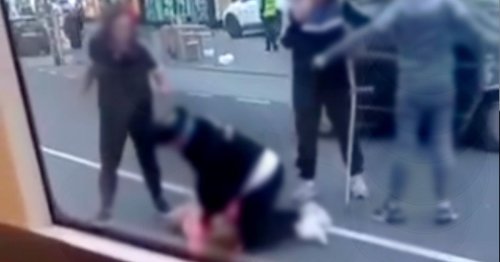Woman kicked and punched on ground as disturbing video shows incident in city