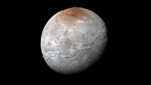 Pluto’s friend Charon has a red hat – now we think we know why