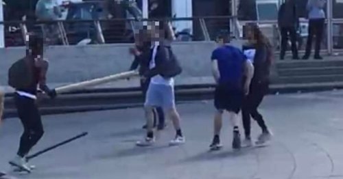 Onlookers horrified as man wields large stick during brawl in Coventry