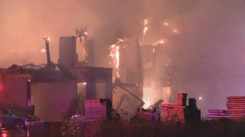 Crews battling large residential fire in Burlington