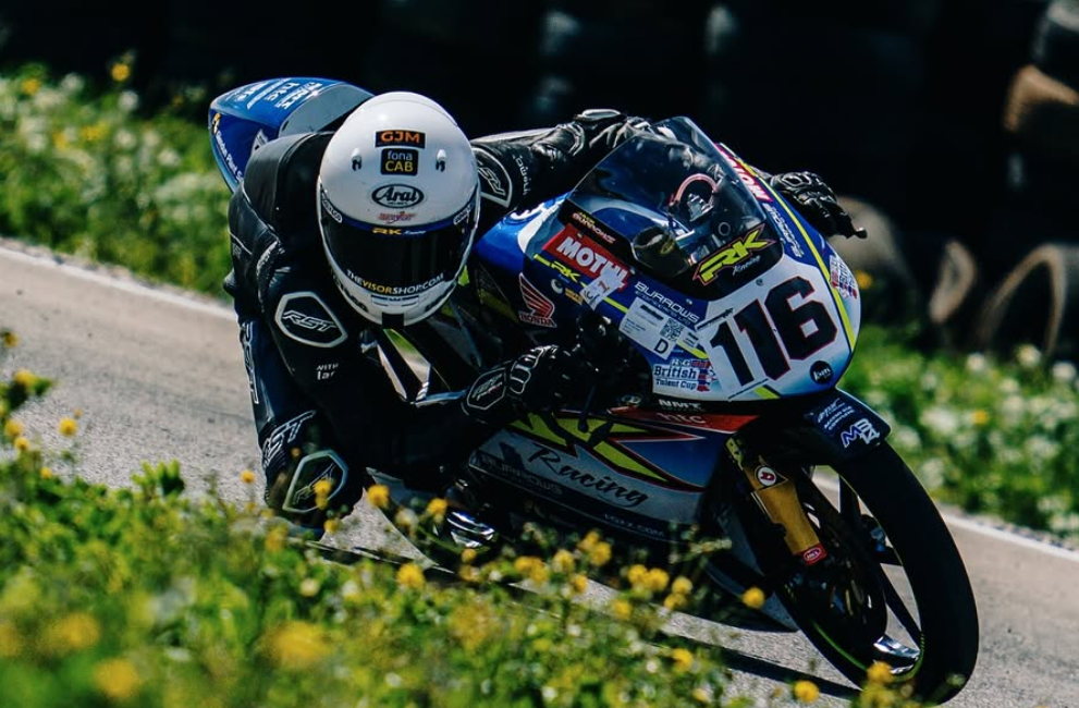 Teenage Northern Irish racer takes on Marc Marquez in Moto3 training session