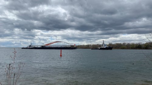 'Iconic' bridge sails into Toronto harbour, one step closer to city's newest island