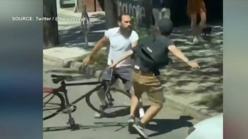 Police investigating after violent altercation between driver and cyclist captured on video