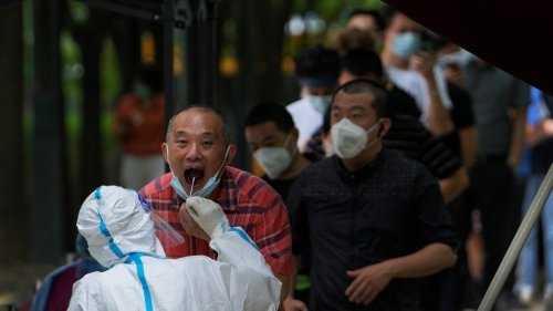 China reduces quarantine for people arriving from abroad