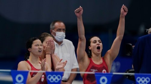 Yes, Maggie Mac Neil has seen the meme of her squinting to see if she won gold