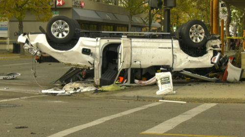 Central Alberta armed carjackings, police pursuit end in fiery crash