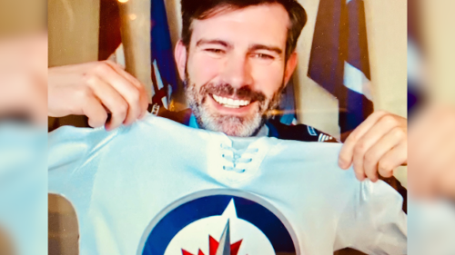 Don Iveson pays the piper and fulfils his end of a bet with Winnipeg mayor