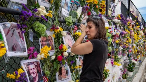 Families, rescuers hold vigil near collapsed building