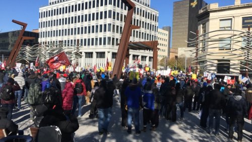 Hundreds of union Crown workers march through downtown Regina
