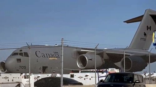 First flight of Afghan refugees who helped CAF arrives in Canada