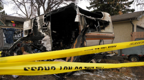 Police investigation underway into RV fire in northwest Calgary backyard