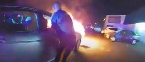 Body Camera Catches Gripping Moment Police Pull Man From Burning Car