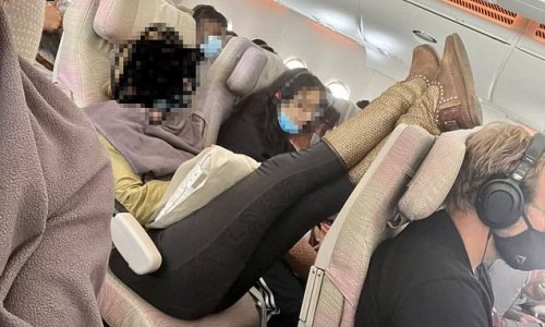 Traveler's 'gross' act on a packed flight is exposed in shocking picture from an angry passenger - but here's why HE'S the one getting abuse