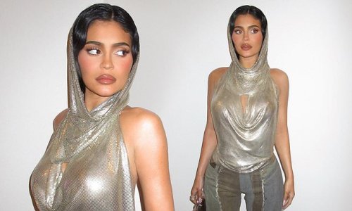Kylie Jenner dazzles in a silver sequin hooded top as she shares snaps of her 'original Kylie' inspired look to social media during London trip